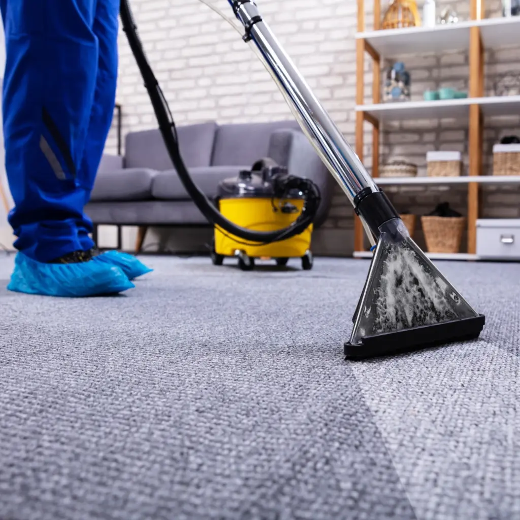 Carpet Fresh Essex employee cleaning a carpet square